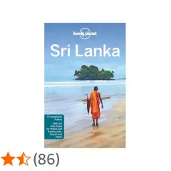 Reiseführer "Sri Lanka" von Lonely Planet. Ein Mönch geht am Strand entlang, im Hintergrund eine kleine Insel. Perfekt für Ihre Reise im April.