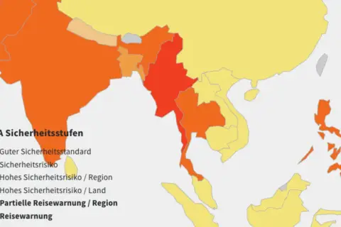 Karte zeigt Sicherheitsstufen für Asien. Thailand hat eine partielle Reisewarnung (orange). Aktuelle reisewarnung thailand beachten.
